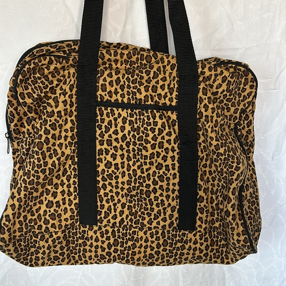 Cheetah brown and black print nylon bag. - Picture 1 of 5